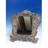 A CONTINENTAL SILVER MOUNTED RECTANGULAR MIRROR, THE OVAL AT THE TOP OF THE ROCOCO FRAME DATED 15