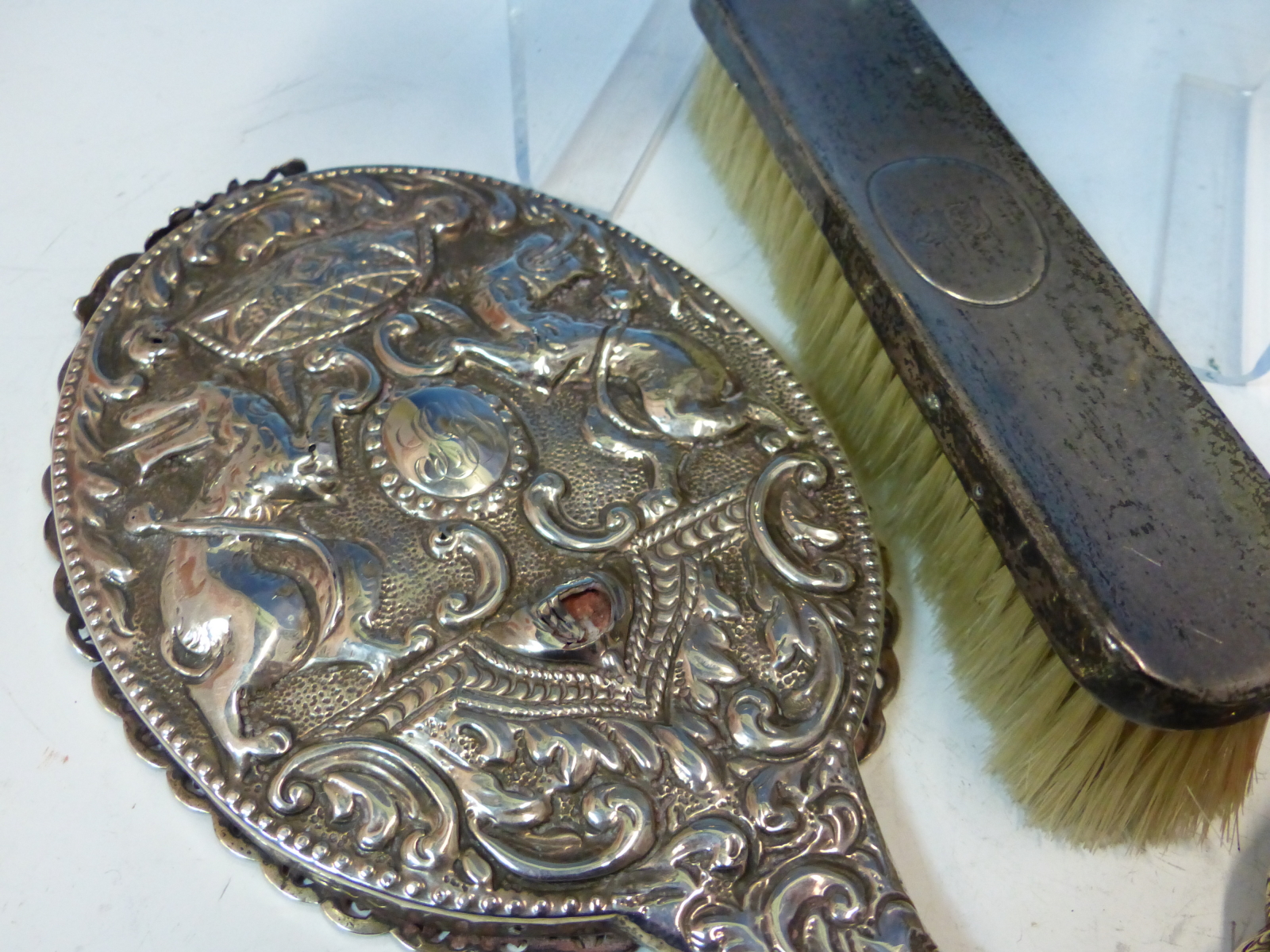 A HALLMARKED SILVER THREE PIECE DRESSING TABLE SET, A FURTHER REPOUSSE DECORATED MIRROR AND BRUSH, A - Image 4 of 8