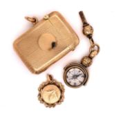A 9ct GOLD VESTA TOGETHER WITH A SPINNING COMPASS FOB AND WATCH KEY AND A FURTHER 9ct GOLD LOCKET.