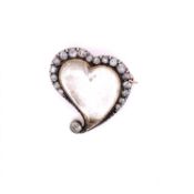 AN EARLY 20th C. ROCK CRYSTAL AND DIAMOND WITCHES HEART BROOCH. MEASUREMENTS 2cms WIDE X 2cms HIGH,