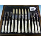 A SILVER HALLMARKED AND MOTHER OF PEARL TWELVE PIECE CUTLERY SET. DATED 1946, SHEFFIELD.