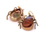 A PAIR OF GOLD INSECT DROP EARRINGS. ONE EARRING HAVING A MULTI GEMSTONE INSERT BODY, THE OTHER