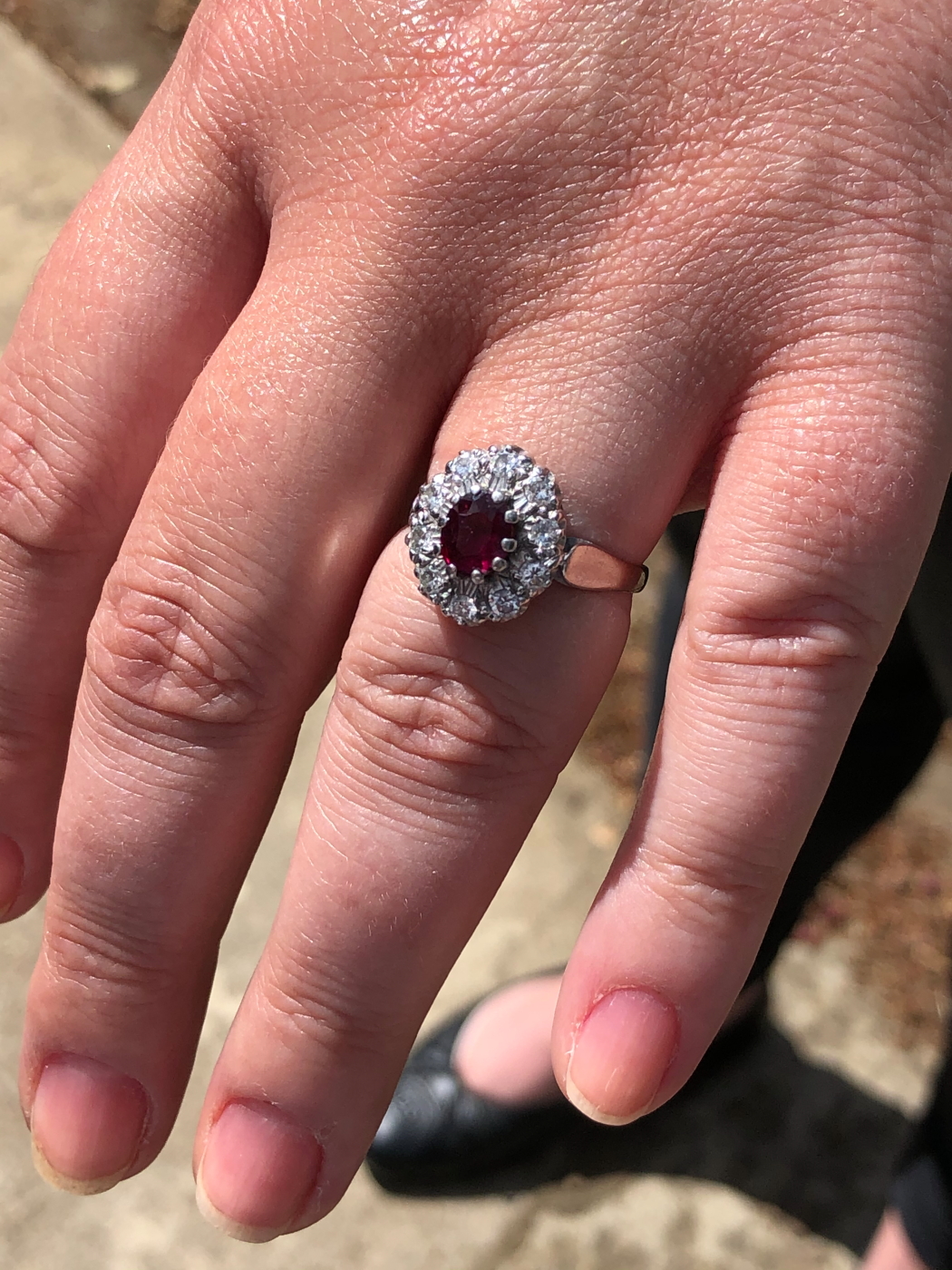 AN 18ct WHITE GOLD RUBY AND DIAMOND CLUSTER RING. THE OVAL CLAW SET RUBY SURROUNDED BY A CLUSTER - Image 9 of 18