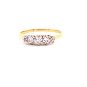 A YELLOW METAL FIVE STONE DIAMOND GRADUATED CLAW SET RING, FINGER SIZE P, GROSS WEIGHT 2.0grms.