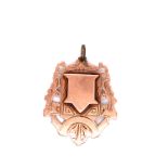 A VICTORIAN 9ct ROSE GOLD SHIELD FOB, DATED 1893. WEIGHT 6.6grms.