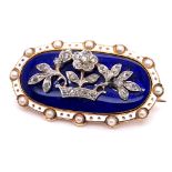 A VICTORIAN GOLD DIAMOND AND ENAMEL BROOCH. AN OLD CUT DIAMOND SET FOLIATE DESIGN TO THE FRONT