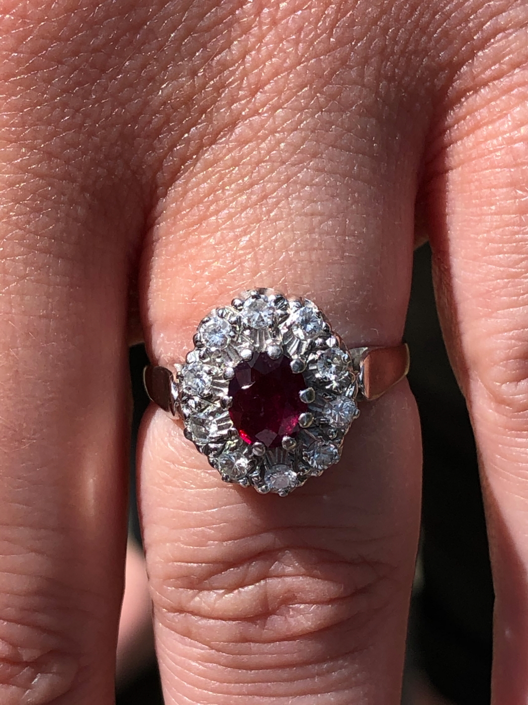 AN 18ct WHITE GOLD RUBY AND DIAMOND CLUSTER RING. THE OVAL CLAW SET RUBY SURROUNDED BY A CLUSTER - Image 10 of 18