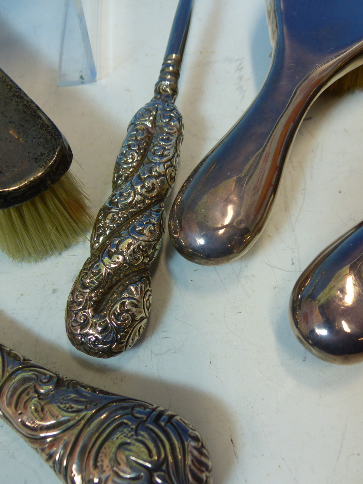 A HALLMARKED SILVER THREE PIECE DRESSING TABLE SET, A FURTHER REPOUSSE DECORATED MIRROR AND BRUSH, A - Image 6 of 8