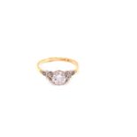 AN 18ct AND PLATINUM DIAMOND SOLITAIRE CLAW SET RING WITH DIAMOND SET FOLIATE SHOULDERS, ON A