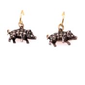 A PAIR OF ANTIQUE PAVE SET DIAMOND WILD BOAR DROP EARRINGS. THE DIAMOND SET BOARS HAVE GEM SET EYES,