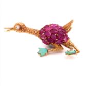 AN ANTIQUE GOLD DUCK BROOCH, SET WITH A CARVED RUBY BODY, TURQUOISE WEBBED FEET, AND A DIAMOND SET