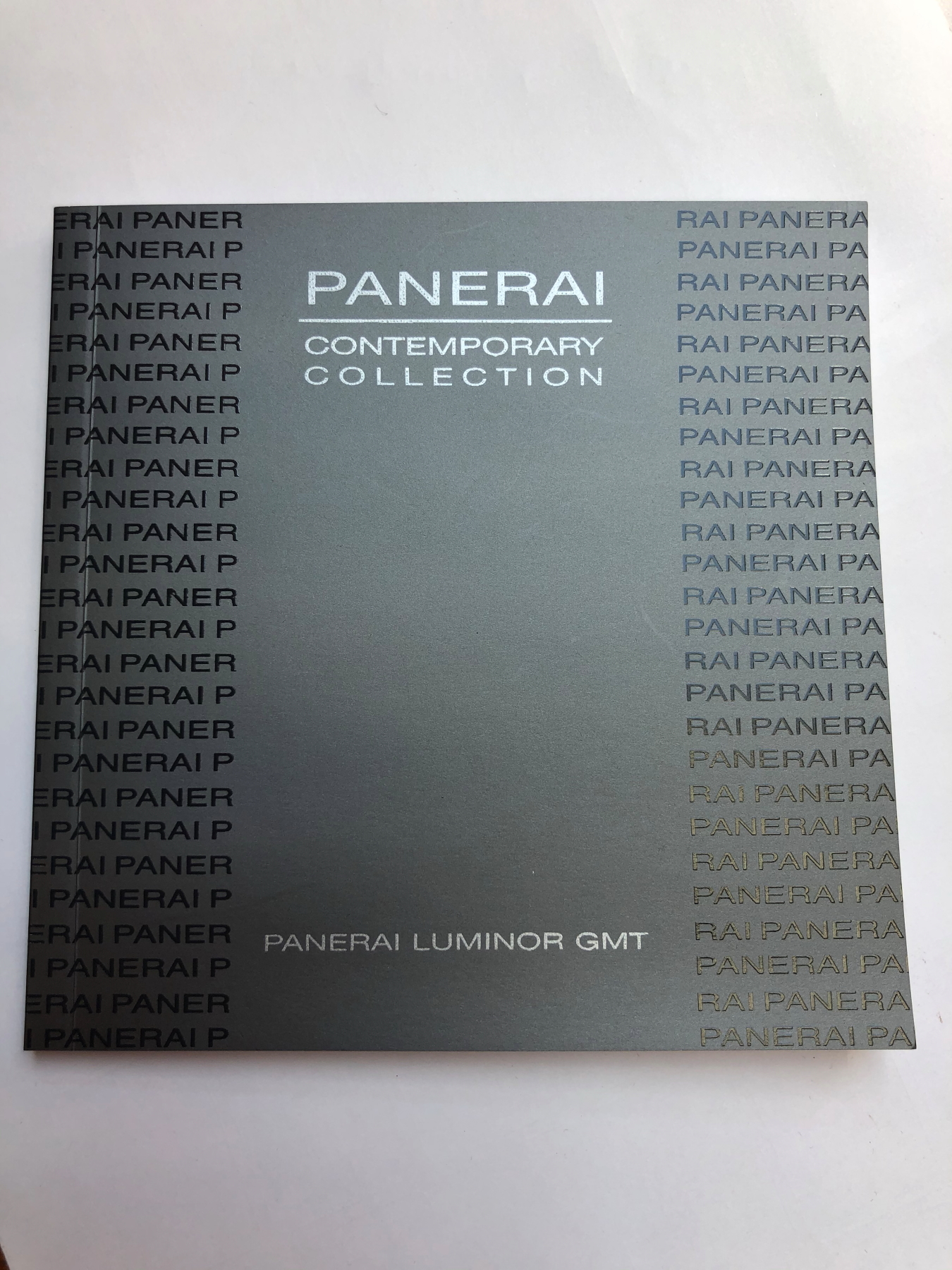 A PANERAI LUMINOR GMT AUTOMATIC WRIST WATCH. BLACK DIAL, TITANIUM CASE AND STAINLESS STEEL BI- - Image 18 of 19