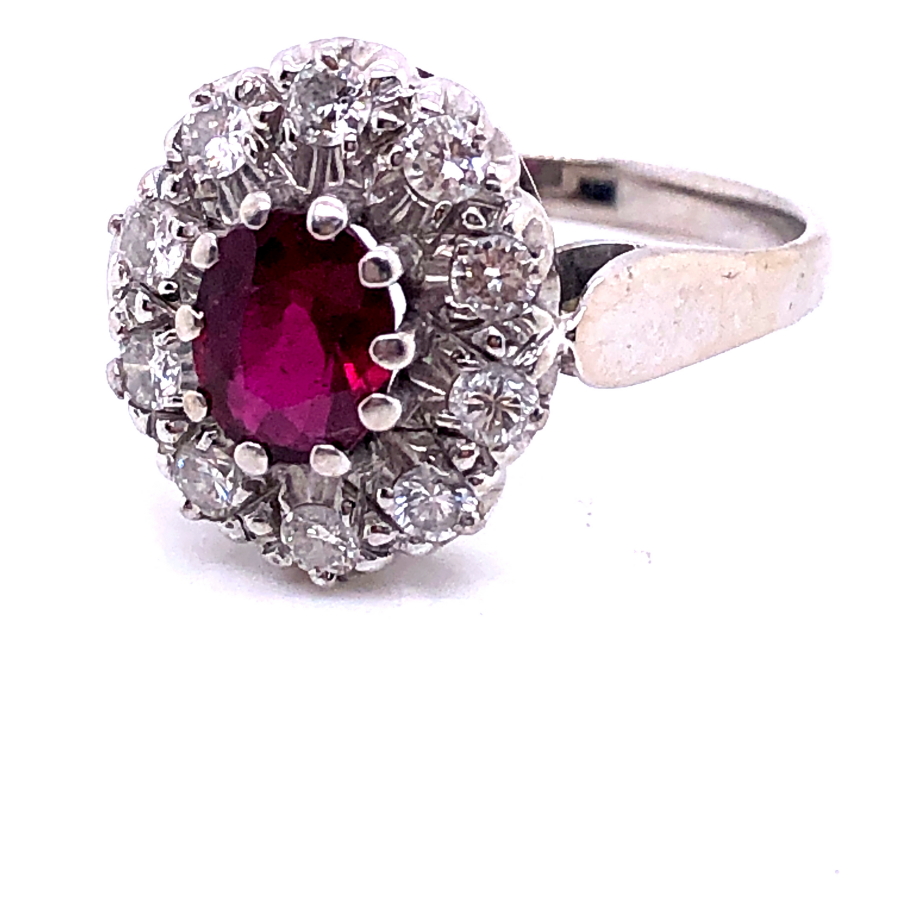 AN 18ct WHITE GOLD RUBY AND DIAMOND CLUSTER RING. THE OVAL CLAW SET RUBY SURROUNDED BY A CLUSTER - Image 5 of 18