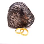 A 22ct WEDDING BAND (3.5grms) AND AN 18ct GOLD (2.9grms) WEDDING BAND CONTAINED IN A SILVER HEART
