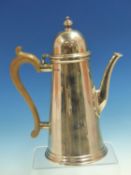 A HALLMARKED SILVER COFFEE POT WITH WOODEN HANDLE DATED 1959 LONDON, FOR GOWLAND BROTHERS. HEIGHT