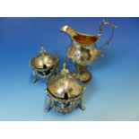 A SILVER HALLMARKED CREAM JUG WITH REPOUSSE DECORATION AND A GILDED INNER DATED 1780 LONDON,FOR