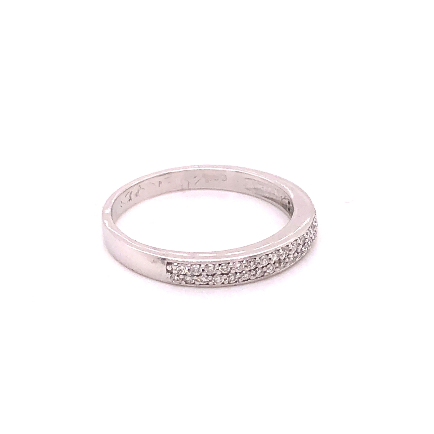 A 14ct WHITE GOLD TWO ROW DIAMOND SET HALF ETERNITY RING. FINGER SIZE M 1/2, GROSS WEIGHT 2.2grms.