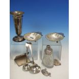 A PAIR OF SHELL FORM BUTTER DISHES COMPLETE WITH GLASS LINERS, A CUT GLASS SIFTER WITH SILVER TOP,