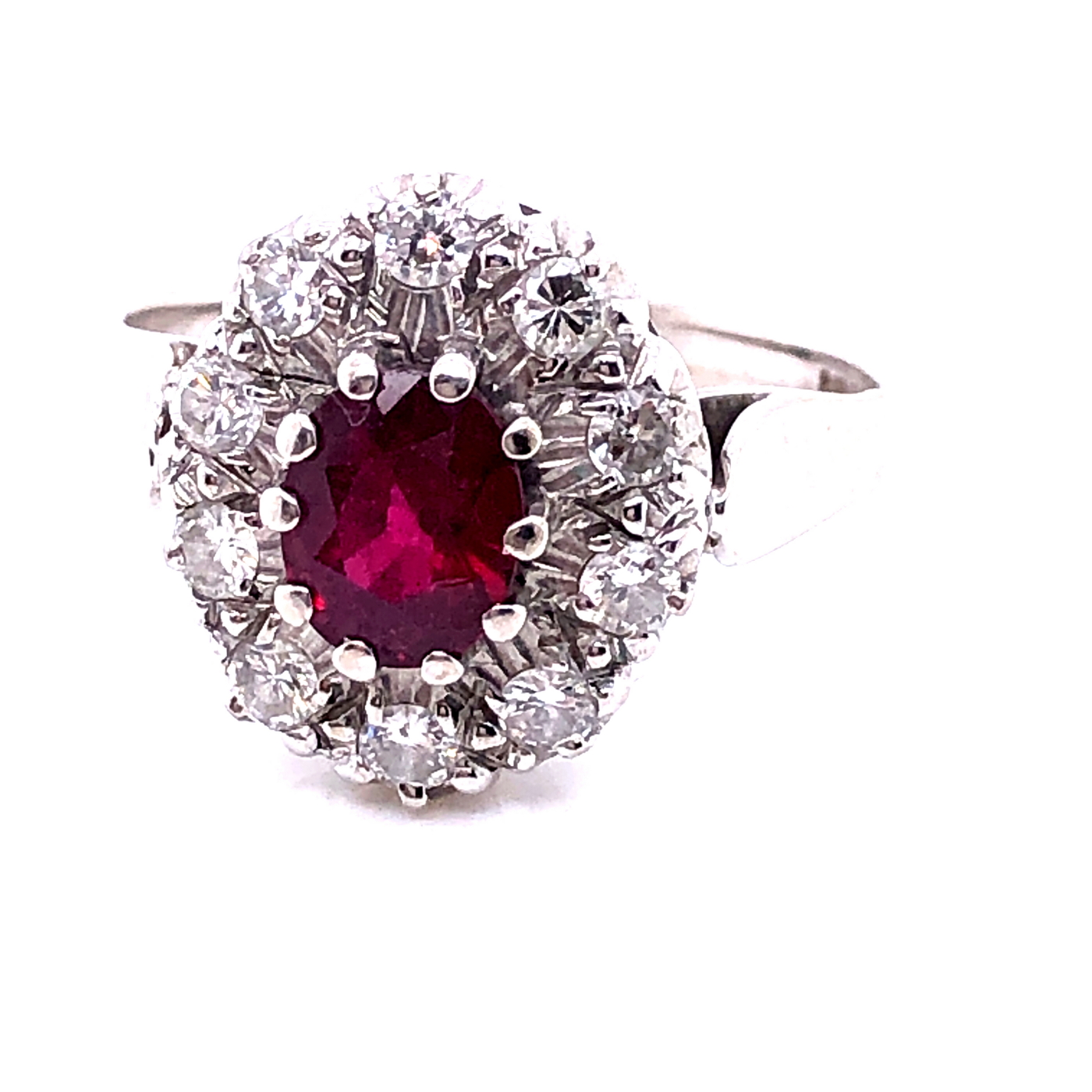 AN 18ct WHITE GOLD RUBY AND DIAMOND CLUSTER RING. THE OVAL CLAW SET RUBY SURROUNDED BY A CLUSTER - Image 18 of 18