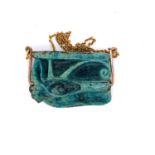 AN ANCIENT EGYPTIAN GREEN GLAZED POTTERY "EYE OF HORUS" PENDANT ON A BESPOKE GOLD MOUNT WITH CHAIN
