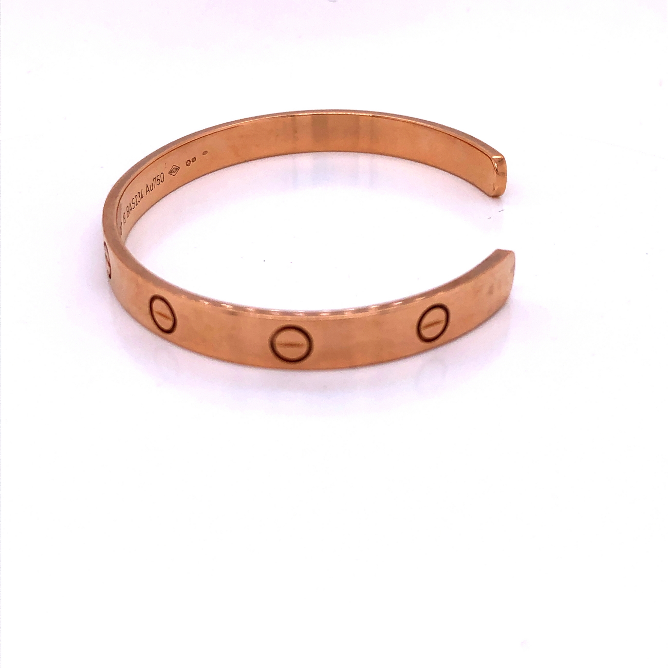 A LADIES 18ct. ROSE GOLD CARTIER TORQUE LOVE BANGLE. SIZE 19. REF NUMBER BAS234. WEIGHT 24.7grms. - Image 7 of 9