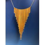AN 18ct GOLD GRADUATED ARTICULATED FRINGE PENDANT NECKLACE COMPLETE WITH MATCHING 18ct GOLD