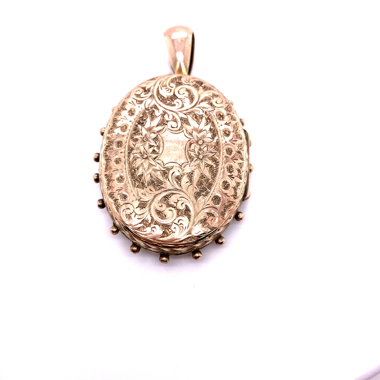 AN ANTIQUE VICTORIAN OVAL GOLD LOCKET WITH AN OLD CUT DIAMOND IN A STARBURST SETTING AND AN ORNATE - Image 5 of 9