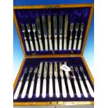 A SET OF HALLMARKED SILVER AND MOTHER OF PEARL HANDLED DESSERT CUTLERY.