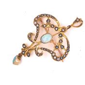 A EDWARDIAN 9ct GOLD OPAL AND SEED PEARL OPEN WORK PENDANT BROOCH. MEASUREMENTS INC BALE 5.4cms X
