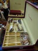 A QTY OF FRENCH HJF PLATED CUTLERY IN LEATHER BOUND CASES.