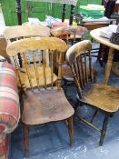 FOUR VICTORIAN KITCHEN CHAIRS AND A WALNUT TABLE.
