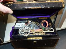 A GOOD ANTIQUE LEATHER JEWELLERY BOX AND CONTENTS.