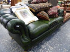 A LEATHER BUTTON UPHOLSTERED SETTEE.