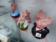 A SET OF WADE PIGGY BANKS.