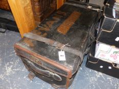 A VINTAGE LEATHER BOUND TRUNK.