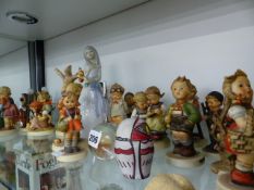 A LARGE QTY OF GOEBELS FIGURINES.