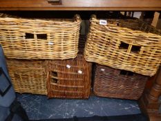 A QTY OF WICKER BASKETS.