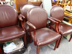 FIVE LEATHER UPHOLSTERED ARMCHAIRS.