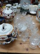 TWO EDWARDIAN TUREENS AND A QTY OF CUT GLASSWARE.