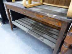 A TEAK GARDEN TABLE.