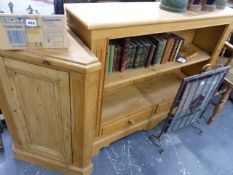 A PINE CORNER CABINET AND A PINE BOOKCASE.