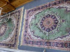 TWO EASTERN RUGS.