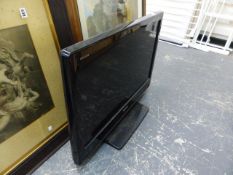 A FLAT SCREEN TV.