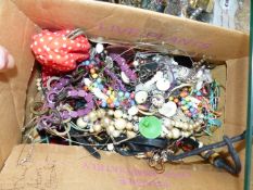 A BOX OF COSTUME JEWELLERY.