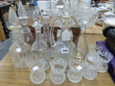 VARIOUS DECANTERS AND GLASSWARES.