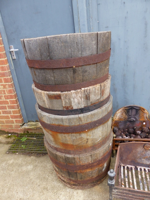 FOUR BARREL FORM PLANTERS.