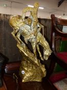 A LARGE BRASS FIGURE.