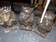 THREE CROUCHING GROTESQUE FIGURES.