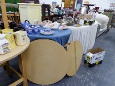 A LARGE OVAL DRESSING TABLE AND VARIOUS DRAPED OCCASIONAL TABLES.