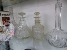 A SMALL CHANDELIER, DECANTERS, ETC.